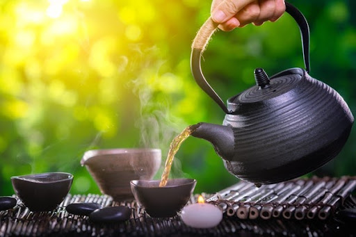 Pouring tea.